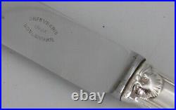 Boulenger, 12 couteaux de table modèle Régence Berry, métal argenté