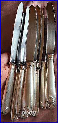 CHRISTOFLE 10 anciens couteaux de table métal argenté modèle coquille Vendôme