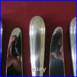 CHRISTOFLE 10 couteaux de table en métal argenté modèle perle