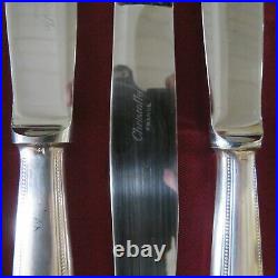 CHRISTOFLE 10 couteaux de table en métal argenté modèle perle