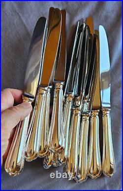 CHRISTOFLE 12 Couteaux de table métal argenté et lames inox Modèle Spatours