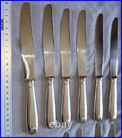 CHRISTOFLE 12 Couteaux de table métal argenté lames inox Modèle coquille Vendôme