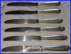 CHRISTOFLE 12 Couteaux de table métal argenté lames inox Modèle coquille Vendôme