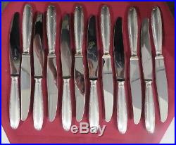 CHRISTOFLE 12 couteaux à entremet en métal argenté modèle rubans