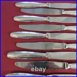 CHRISTOFLE 12 couteaux à entremet en métal argenté modèle rubans 1
