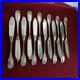 CHRISTOFLE-12-couteaux-a-poisson-en-metal-argente-modele-Versailles-01-man