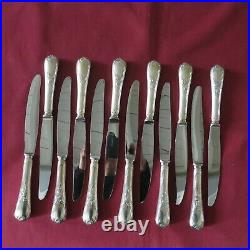 CHRISTOFLE 12 couteaux de table en métal argenté modèle marly
