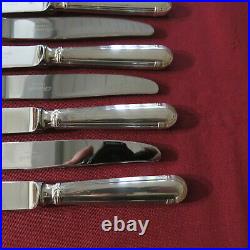 CHRISTOFLE 12 couteaux de table en métal argenté modèle oceana L 24,2 cm
