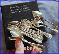 CHRISTOFLE 12 cuillères à moka en métal argenté modèle coquille VENDOME