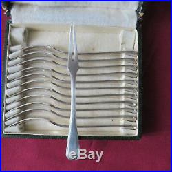 CHRISTOFLE 12 fourchettes a escargot en métal argenté modèle america en écrin