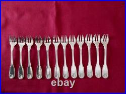 CHRISTOFLE 12 fourchettes à huîtres en métal argenté modèle coquille Vendôme 4