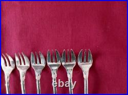 CHRISTOFLE 12 fourchettes à huîtres en métal argenté modèle coquille Vendôme 4