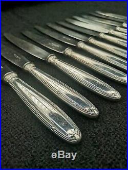 CHRISTOFLE PARIS MODELE RUBAN, 12 couteaux de table, métal argenté