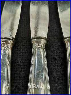 CHRISTOFLE PARIS MODELE RUBAN, 12 couteaux de table, métal argenté