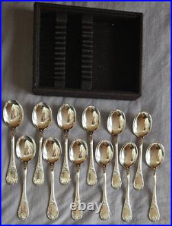 CHRISTOFLE modèle MARLY Cuvette puzzle de 12 cuillères à glace en métal argenté