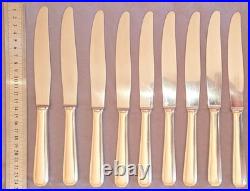 CHRISTOFLE suite 9 couteaux de table modèle AMERICA en métal argenté