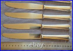 CHRISTOFLE suite 9 couteaux de table modèle AMERICA en métal argenté