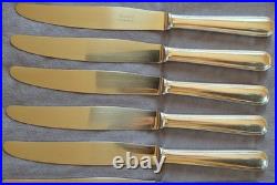 CHRISTOFLE suite 9 couteaux de table modèle AMERICA en métal argenté