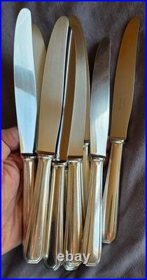 CHRISTOFLE suite 9 couteaux de table modèle AMERICA en métal argenté