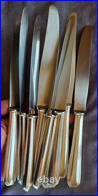 CHRISTOFLE suite 9 couteaux de table modèle AMERICA en métal argenté