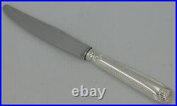 Cailar Bayard, 12 couteaux de table modèle Coquille, métal argenté