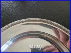 Christofle Plat rond de service modèle Rubans croisés en métal argenté