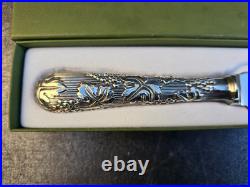 Christofle couteau a pain modele vinea en metal argente proche du neuf 1/2