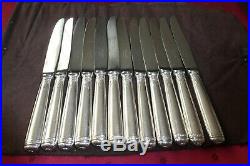 Christofle modèle Malmaison 12 couteaux à dessert en métal argenté Malmaison