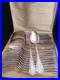Christofle-modele-Rubans-croises-Menagere-24-P-Cuilleres-a-soupe-fourchettes-01-fliz