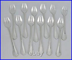 Christofle modèle Spatours 12 fourchettes à huitres excellent état métal argenté