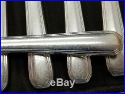 Christofle série de 12 couteaux métal argentée modèle América