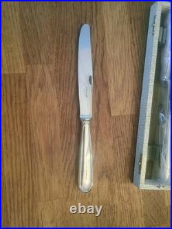 Coffret 12 couteaux à poisson Christofle modèle Spatours métal argenté 90