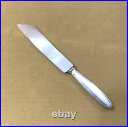 Couteau à pain CHRISTOFLE modèle RUBANS métal argenté Couvert de service 26 cm