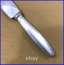 Couteau à pain CHRISTOFLE modèle RUBANS métal argenté Couvert de service 26 cm