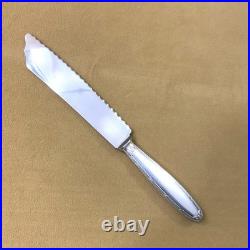 Couteau à pain CHRISTOFLE modèle RUBANS métal argenté Couvert de service 26 cm