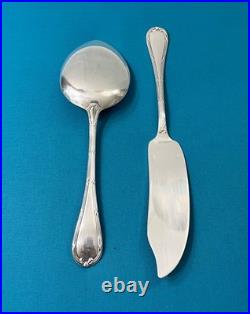 Couverts de service a glace CHRISTOFLE modèle RUBANS CROISÉS métal argenté pelle