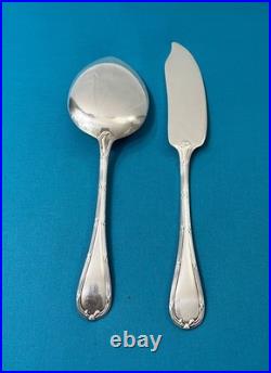 Couverts de service a glace CHRISTOFLE modèle RUBANS CROISÉS métal argenté pelle