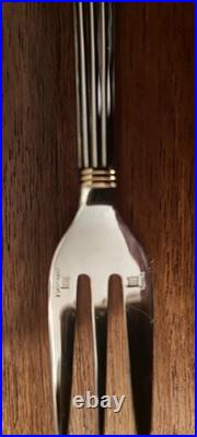 Douze fourchettes à dessert métal argenté Christofle Modèle Aria bicolore