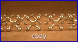 Ensemble de 12 Porte-couteaux en métal argenté Christofle modèle 4 Boules