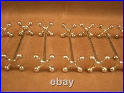 Ensemble de 12 Porte-couteaux en métal argenté Christofle modèle 4 Boules