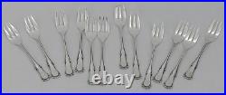 Ercuis modèle Valençay, 12 fourchettes à gâteaux en métal argenté excellent état