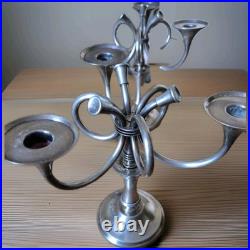 Ercuis paire de chandelier modèle Cheverny métal argenté décor au cors de chasse