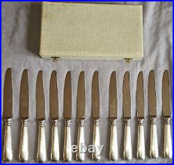 FELIX FRERES Coffret 12 Couteaux de table métal argenté modèle Baguette Fidelio FELIX FRERES Coffret 12 Couteaux de table métal argenté modèle Baguette Fidelio