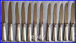 FELIX FRERES Coffret 12 Couteaux de table métal argenté modèle Baguette Fidelio FELIX FRERES Coffret 12 Couteaux de table métal argenté modèle Baguette Fidelio
