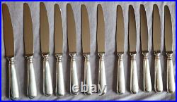 FELIX FRERES Coffret 12 Couteaux de table métal argenté modèle Baguette Fidelio FELIX FRERES Coffret 12 Couteaux de table métal argenté modèle Baguette Fidelio