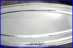 Grand plat ovale a poisson en métal argenté Christofle modèle perles longueur 69