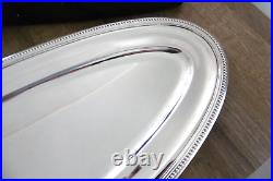 Grand plat ovale a poisson en métal argenté Christofle modèle perles longueur 69