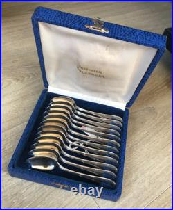 Lot 12 cuilléres MOKA Métal Argenté Christofle Modèle filet ruban Lot 12 cuilléres MOKA Métal Argenté Christofle Modèle filet ruban