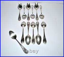 Lot 12 cuillères à dessert en métal argenté APOLLO modèle Rocaille