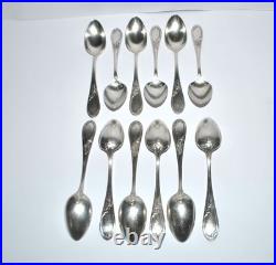 Lot 12 cuillères à dessert en métal argenté APOLLO modèle Rocaille